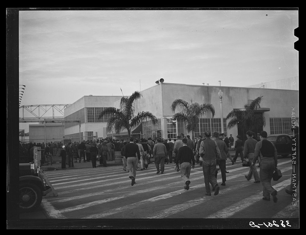 [Untitled photo, possibly related to: Workmen entering Consolidated Aircrafts early in the morning. San Diego, California]…