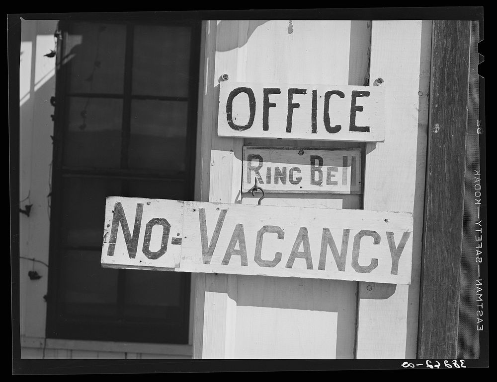 No vacancy sign at tourist court. Corpus Christi, Texas. As the courts have filled up with workmen and their families these…