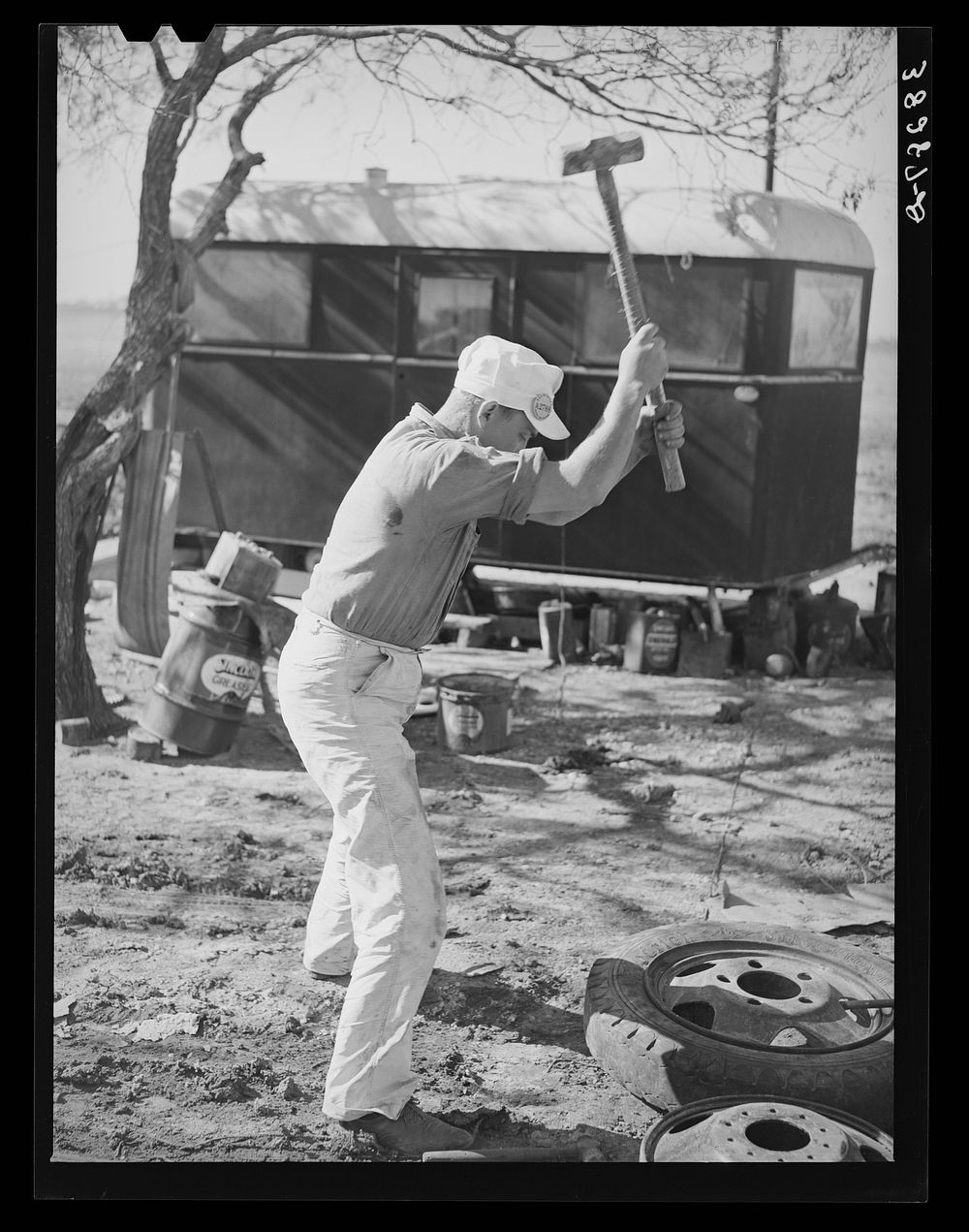 Truck driver repairing tire. Corpus Free Photo rawpixel
