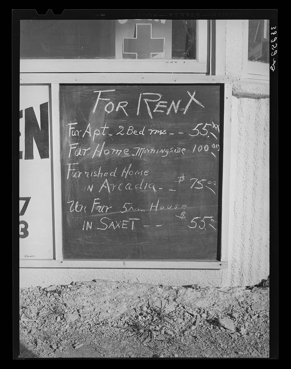 [Untitled photo, possibly related to: Sign in front of real estate office which shows the rent scale. Corpus Christi, Texas]…