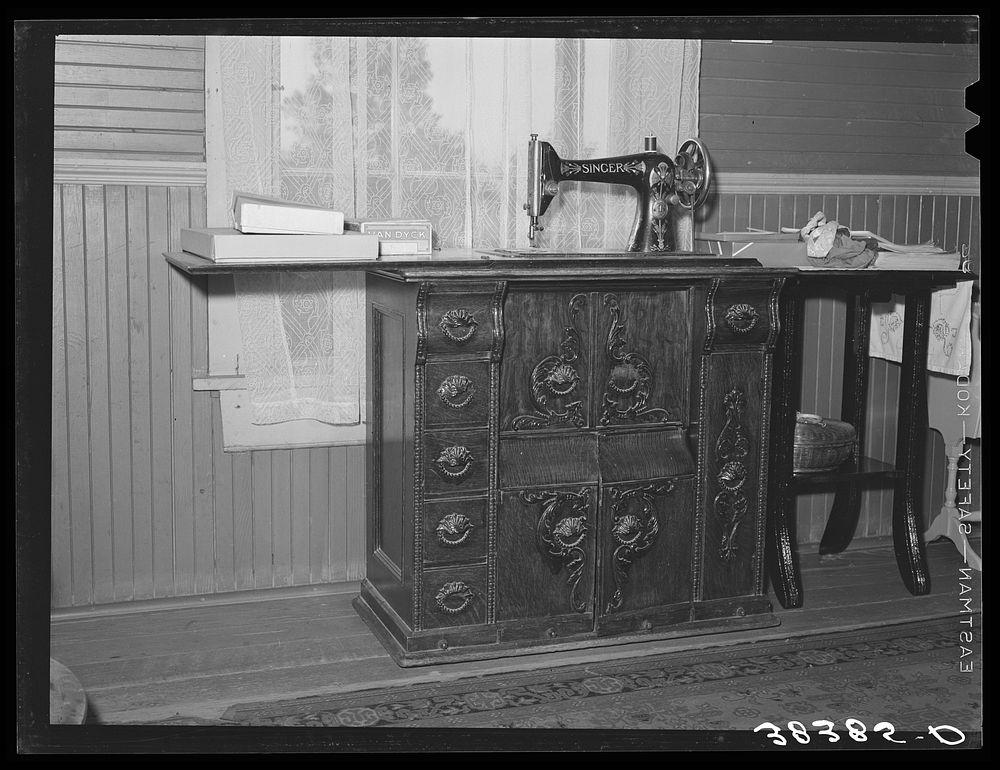 Sewing machine in house of fruit farmer. Placer County, California by Russell Lee