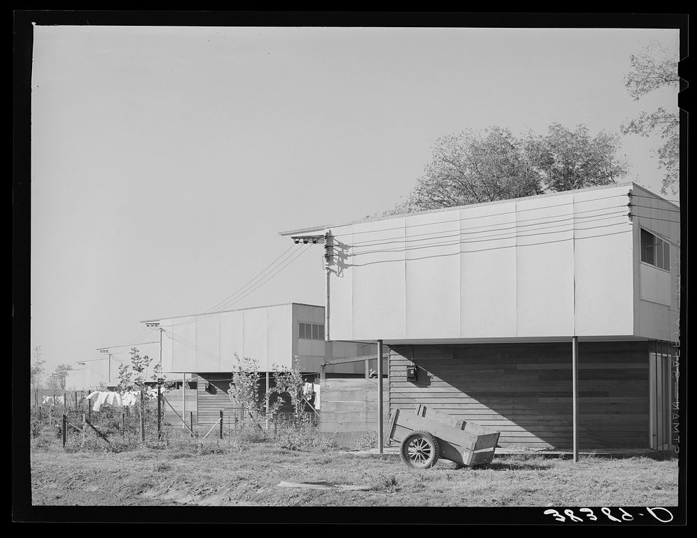 End of apartment house for permanent farm workers at the Yuba City FSA (Farm Security Administration) farm workers' camp.…
