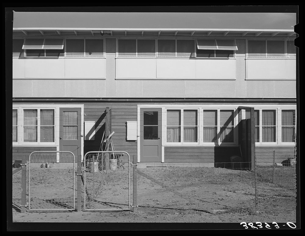 Back of apartment building for permanent farm workers. Yuba City FSA (Farm Security Administration) farm workers' camp. Yuba…