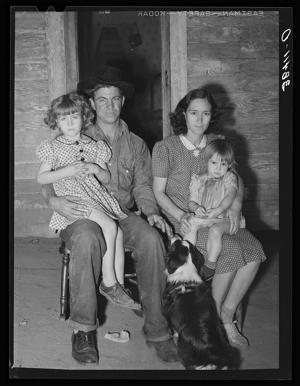 Young man, his wife and children. They came from Oklahoma with his father and mother. His father has bought a farm and…