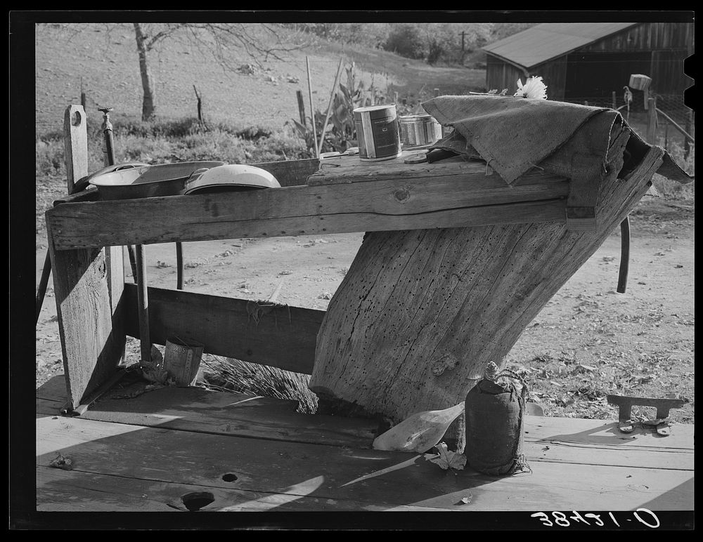 Wash bench on back porch of fruit farmer's house. Placer County, California by Russell Lee