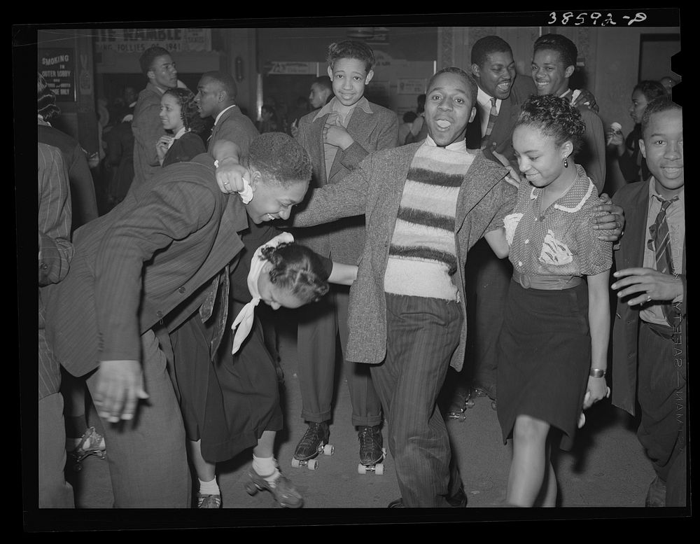 Having fun at rollerskating rink of Savoy Ballroom. Chicago, Illinois by Russell Lee