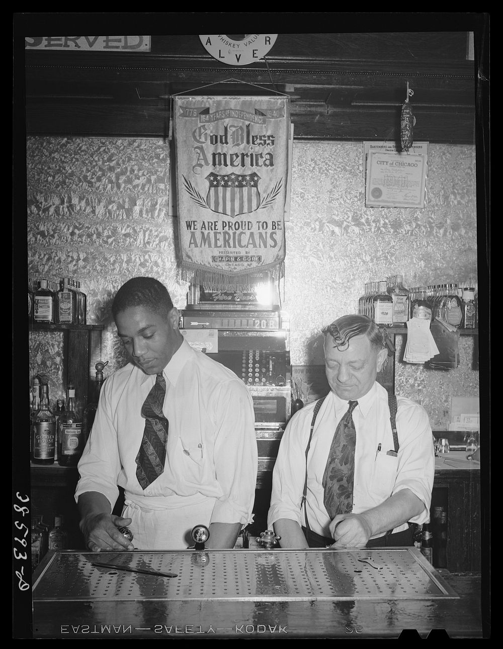 Bartender and owner of tavern on the southside of Chicago, Illinois by Russell Lee