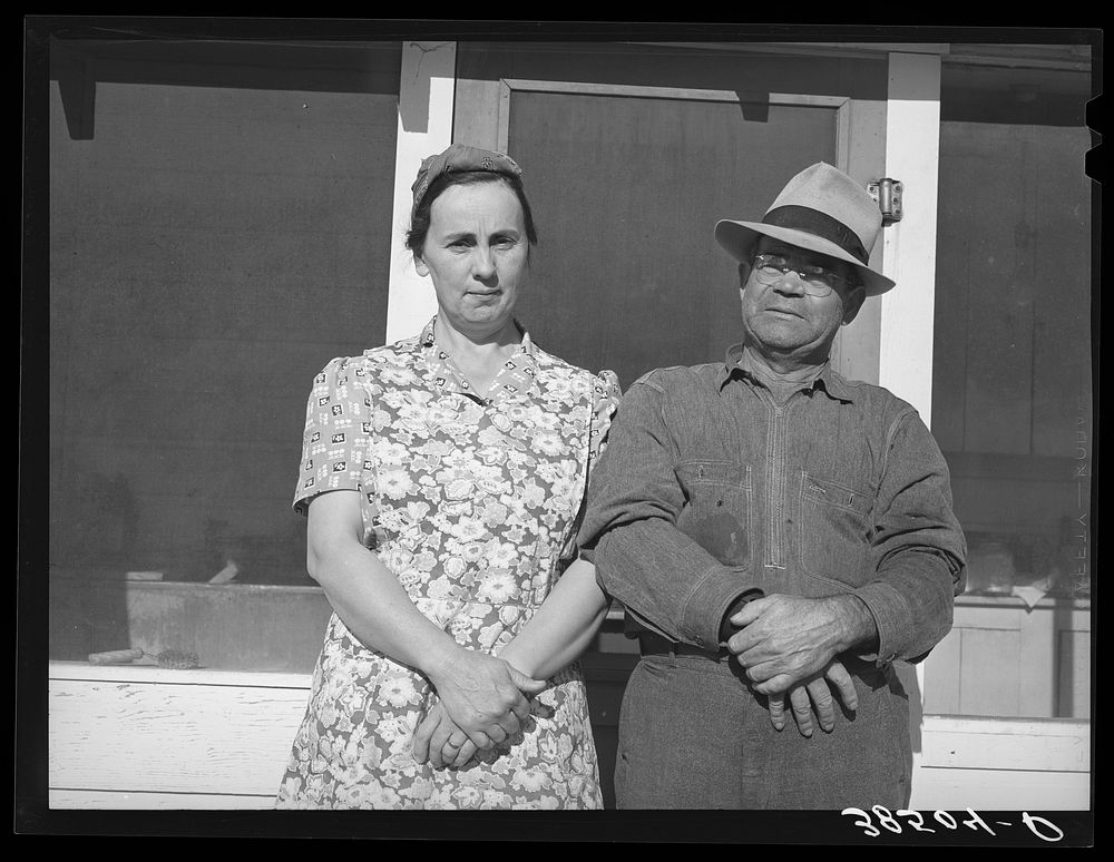 Fruit farmer and his wife, Placer County, California. This couple have changed the varieties of fruit which they grow to…