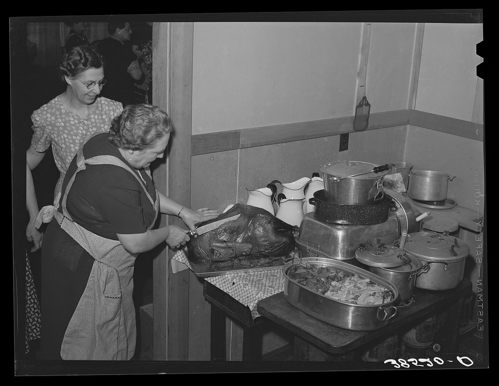 In the kitchen at dinner of the Loomis Fruit Association. Loomis, Placer County, California by Russell Lee