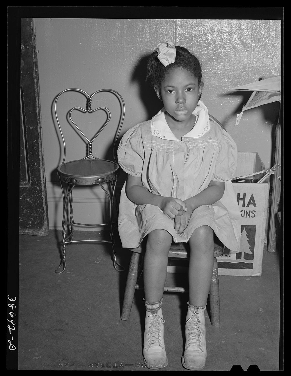 Little girl at nursery. Chicago, Illinois by Russell Lee