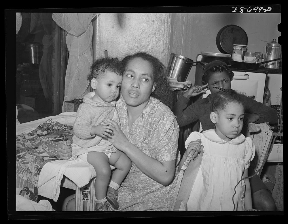 Mother and children at home. Chicago, Illinois by Russell Lee