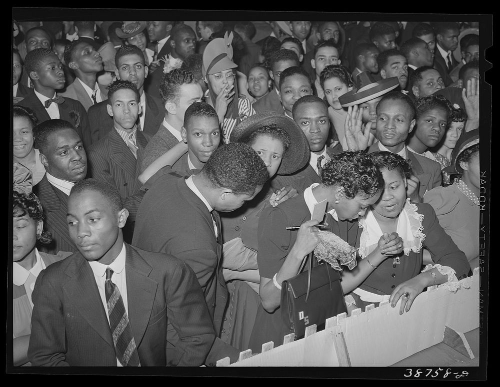 Detail of crowd watching the orchestra at the Savoy Ballroom. Chicago, Illinois by Russell Lee