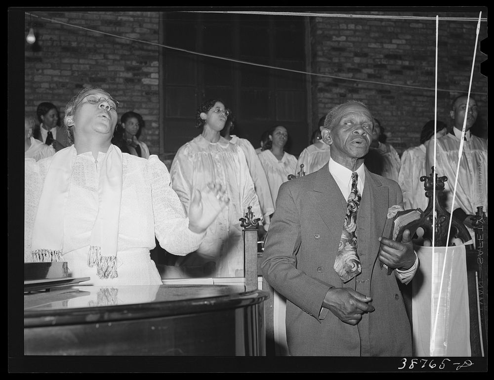 Singing at a Pentecostal church. Chicago, Illinois by Russell Lee