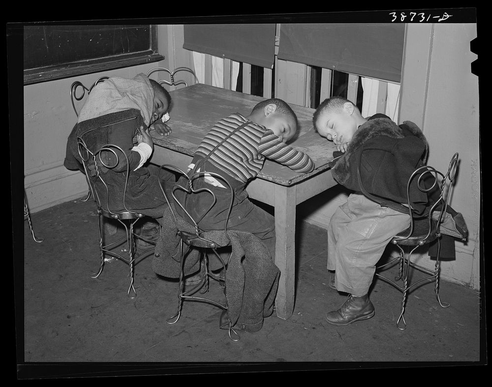 Boys during rest period at nursery. There is a shortage of beds. Chicago, Illinois by Russell Lee