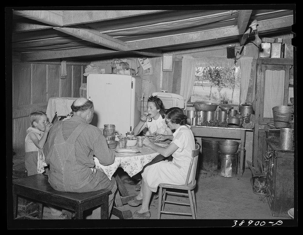 The Browning family eating lunch. They are FSA (Farm Security Administration) rehabilitation borrowers on the Vale-Owyhee…