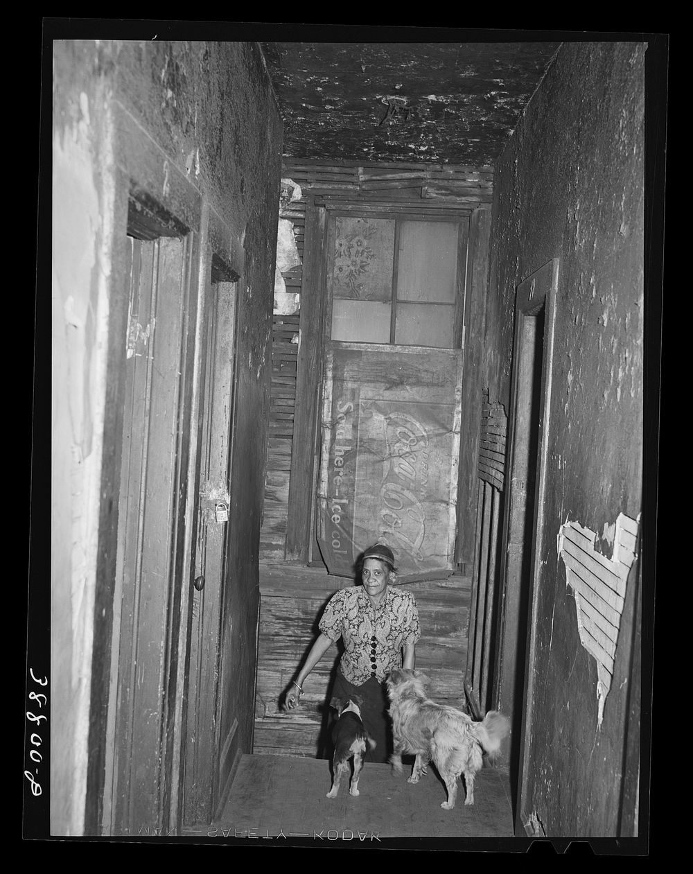 [Untitled photo, possibly related to: Entrance to second floor of rooming house. Chicago, Illinois] by Russell Lee