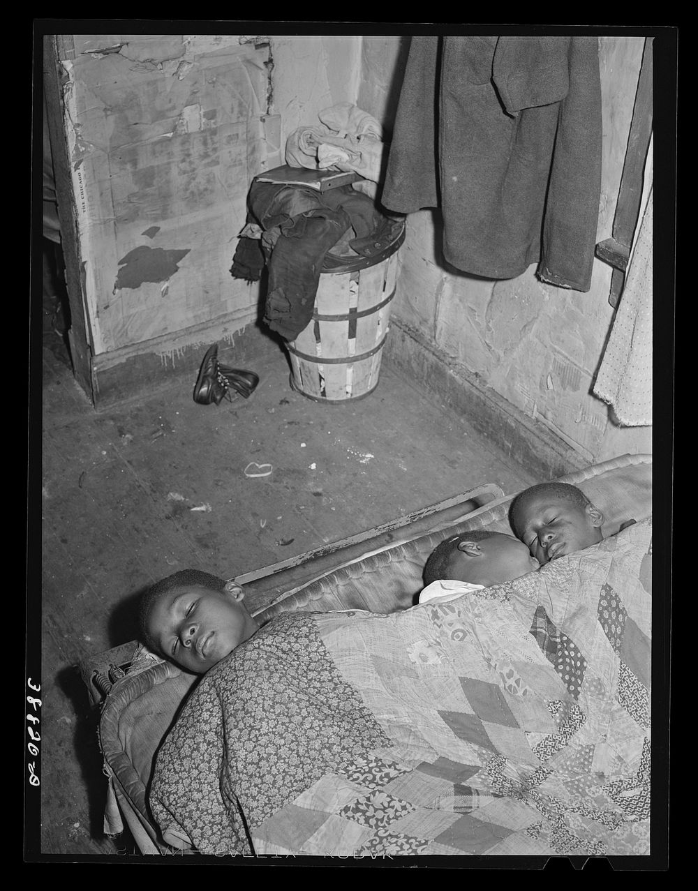  children asleep. Southside of Chicago, Illinois by Russell Lee