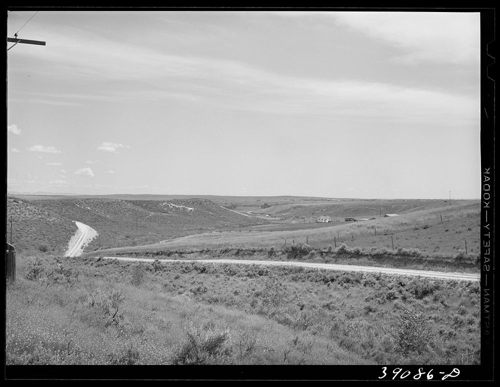 Road leading up to bench land. Vale-Owyhee irrigation project, Malheur County, Oregon. While the higher bench land is not so…