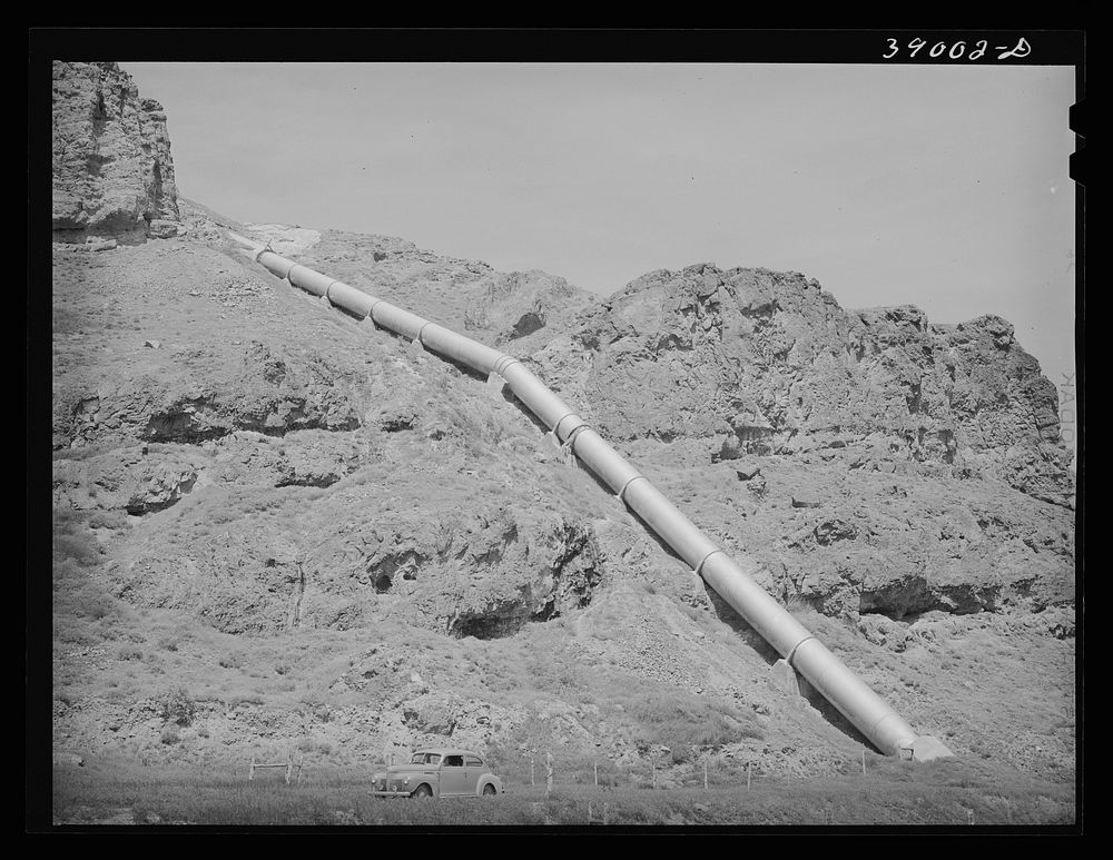 Conduit carrying irrigation water from Owyhee Reservoir to farm land on the Vale-Owyhee Project. Malheur County, Oregon by…