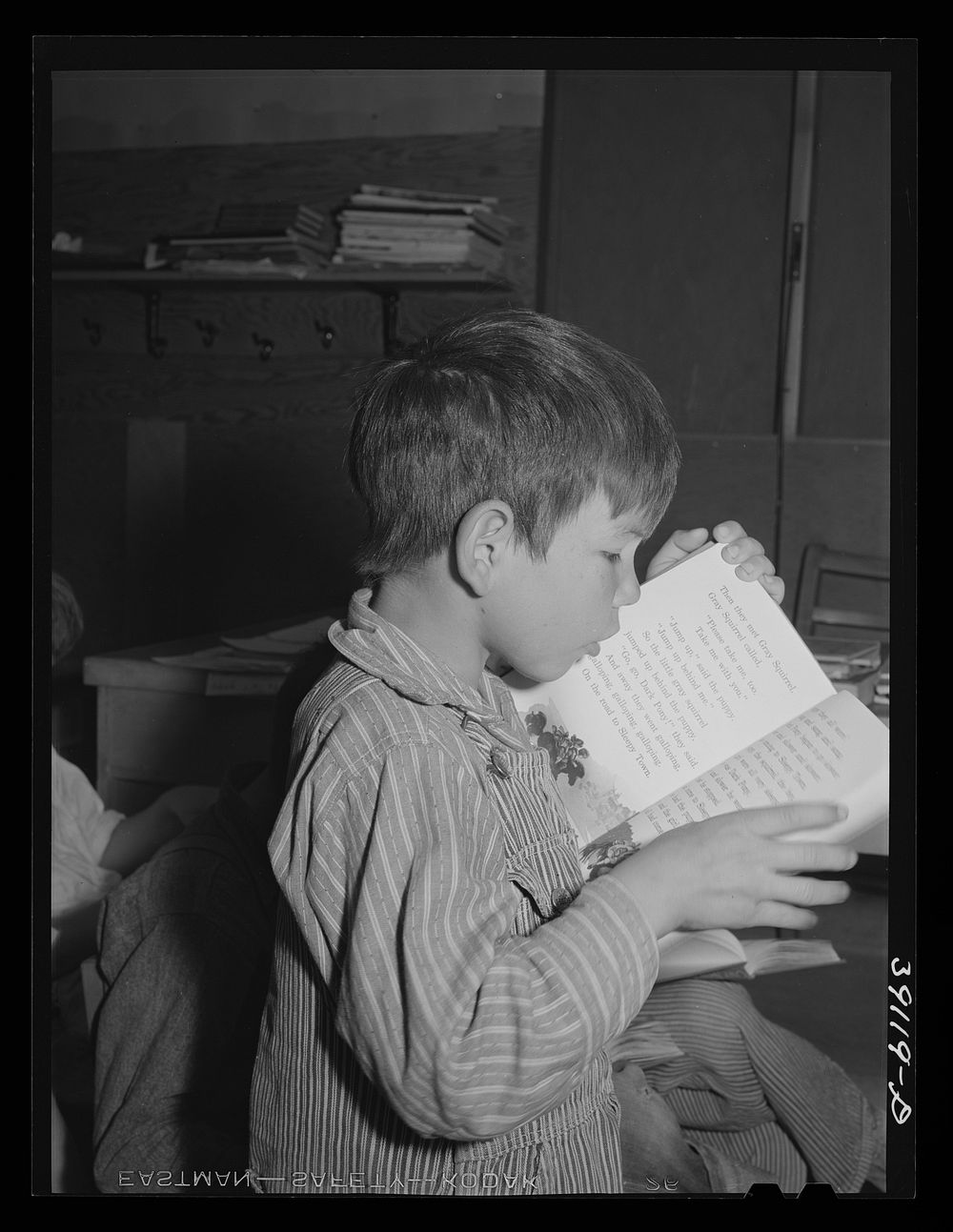 [Untitled photo, possibly related to: Children in school at the FSA (Farm Security Administration) farm workers' camp.…
