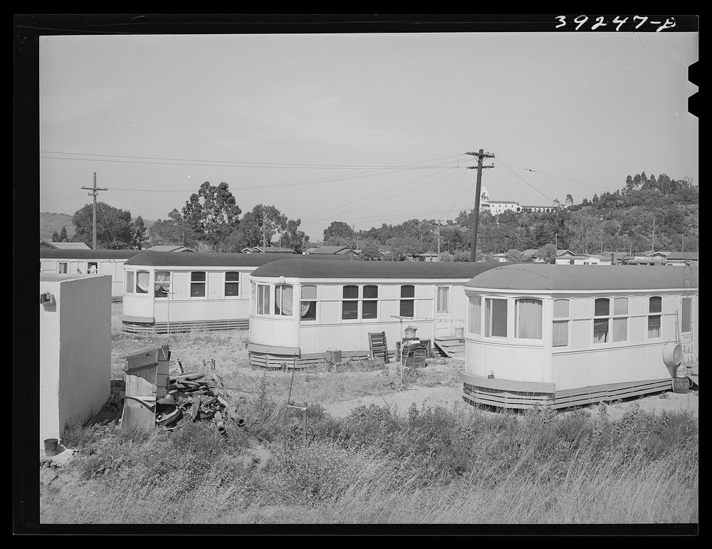 [Untitled photo, possibly related to: Streetcars which have been converted into dwellings. These rent for twenty-five…