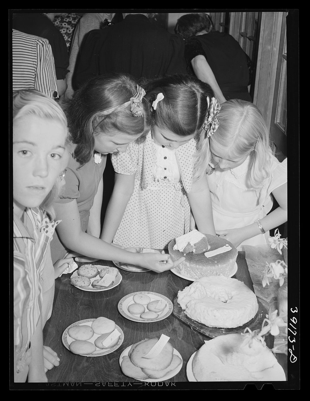 [Untitled photo, possibly related to: Children having refreshments at the 4-H Club Spring fair at Adrian, Oregon] by Russell…