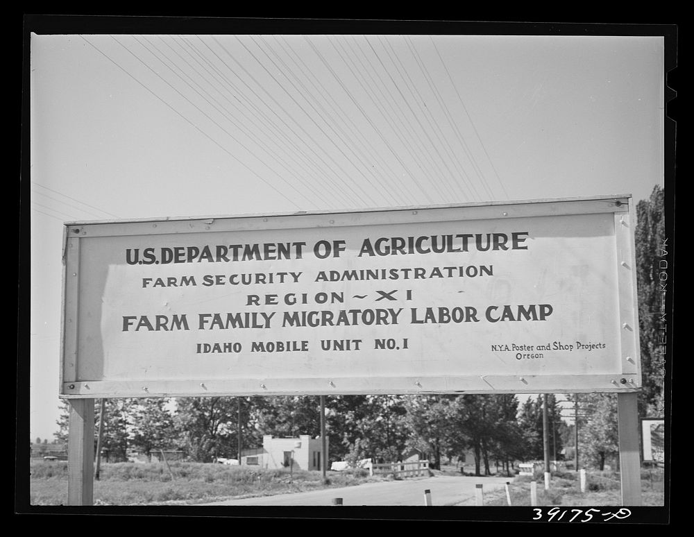 Sign. FSA ( Farm Security Administration) migratory labor camp mobile unit. Wilder, Idaho by Russell Lee