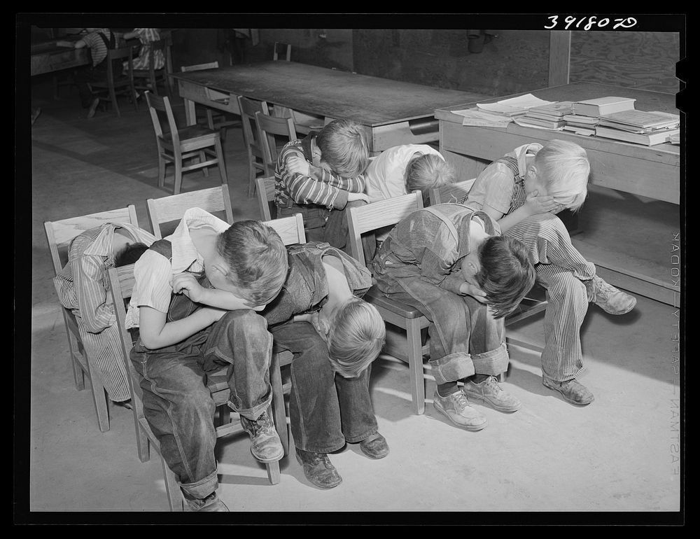 Schoolchildren playing a game at the FSA (Farm Security Administration) farm workers' camp. Caldwell, Idaho by Russell Lee