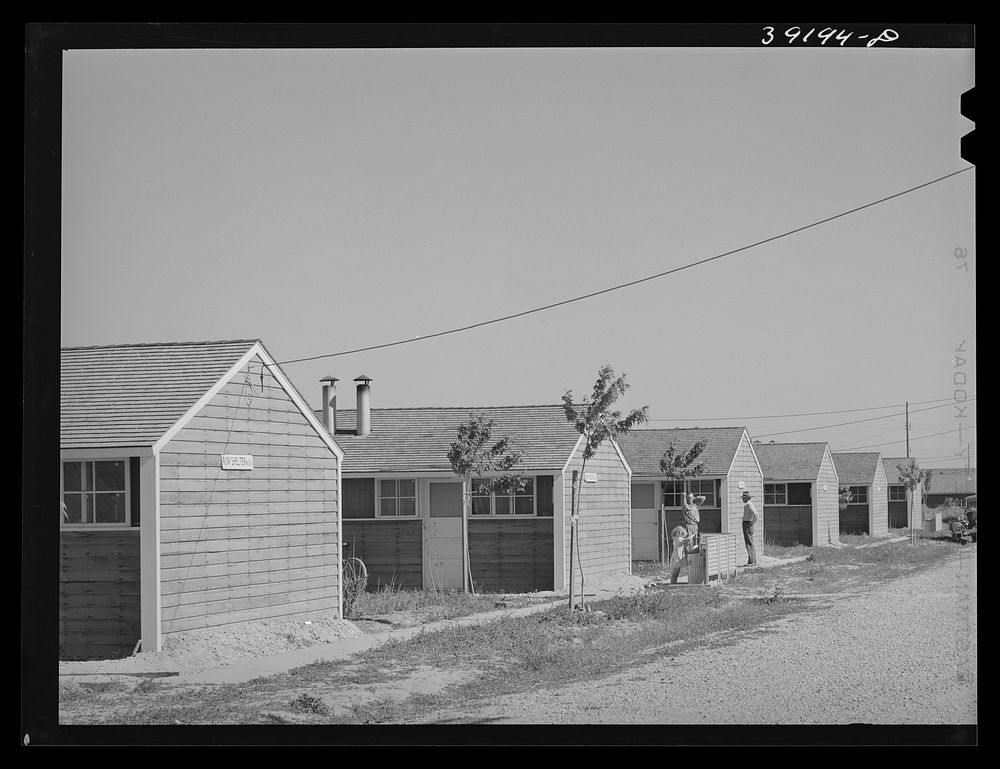 Row shelters at the FSA (Farm Security Administration) farm workers' camp. Caldwell, Idaho by Russell Lee