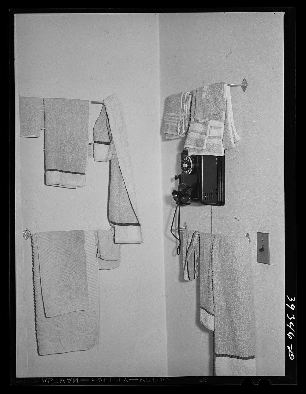 Towels in boarding house for single men. San Diego, California by Russell Lee