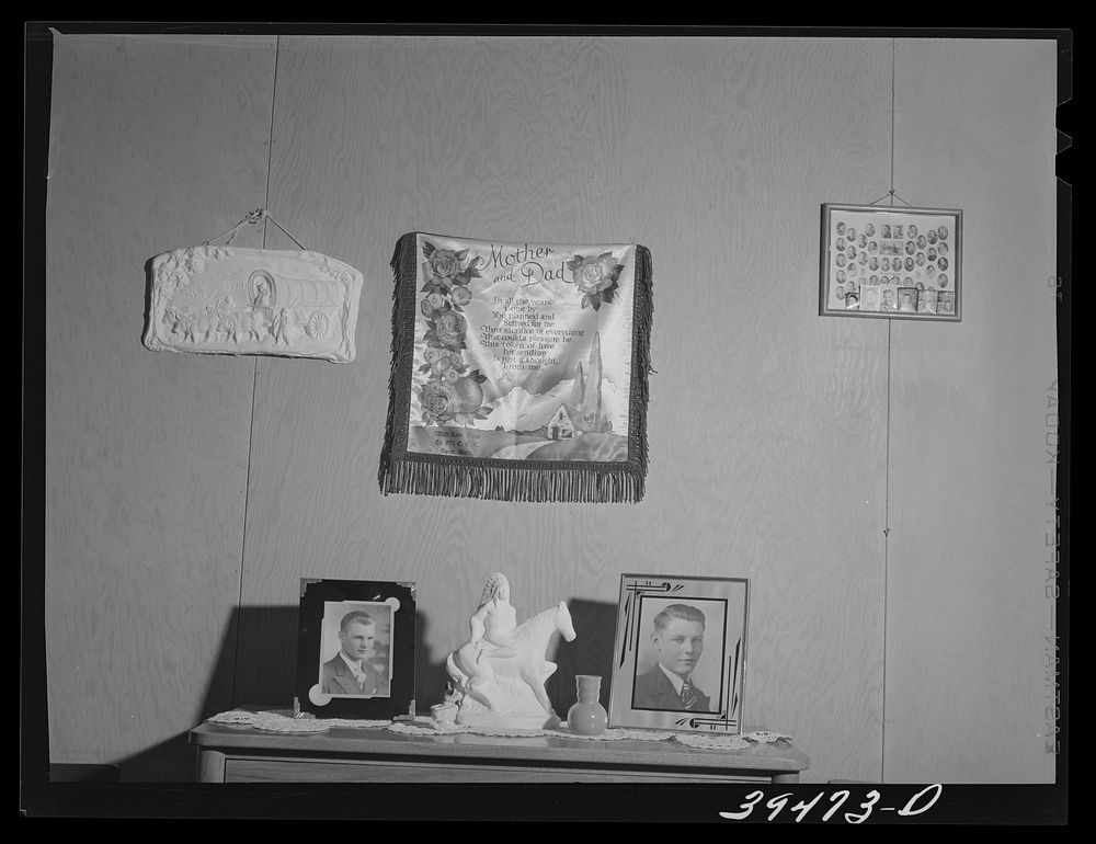 Decorations in cottage home of permanent farm worker at the FSA (Farm Security Administration) labor camp. Caldwell, Idaho…