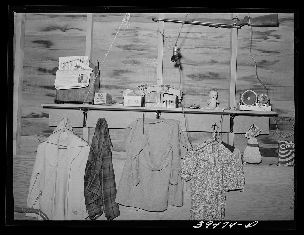 Clothing, etc. in row shelter for farm workers at the FSA (Farm Security Administration) labor camp. Caldwell, Idaho by…