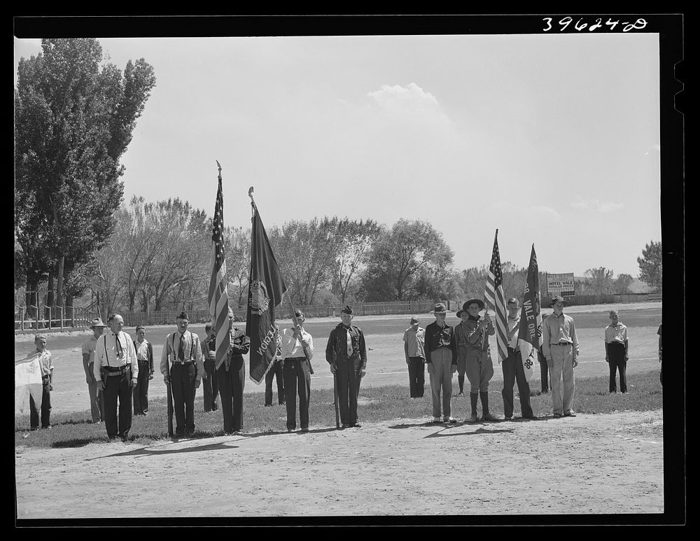 Members of the American Legion and Boy Scouts stand at attention while Chief Justice Stone delivered the oath of allegiance…