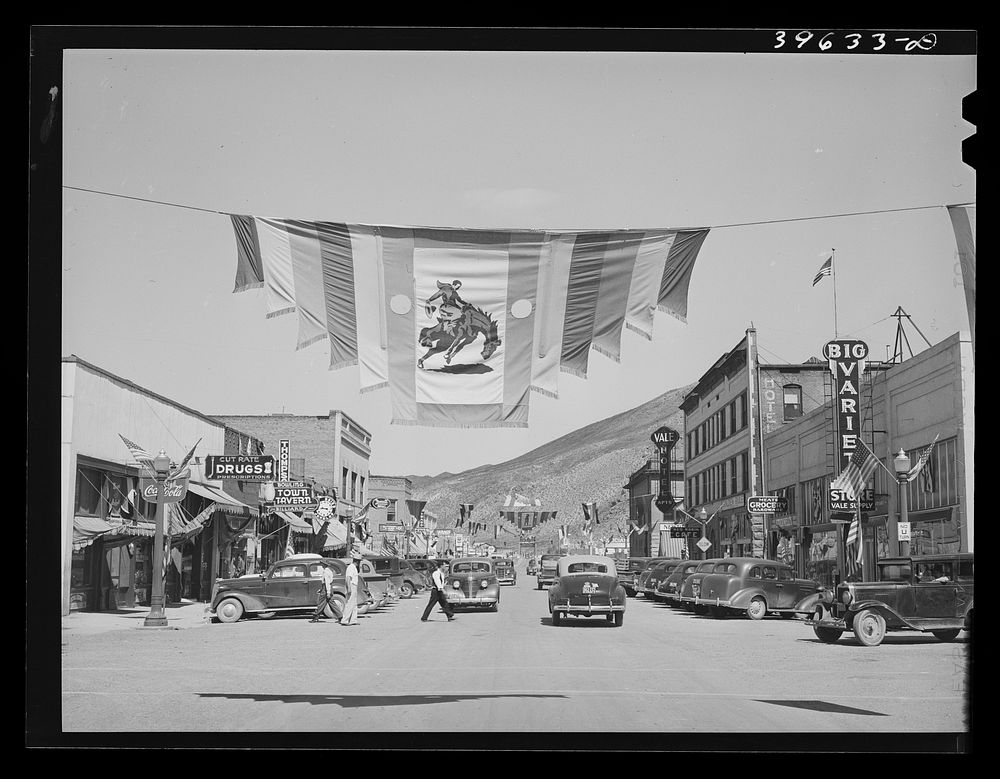 Main street of Vale, Oregon, on the Fourth of July. Vale is one of the shopping centers for the farmers who live and work on…