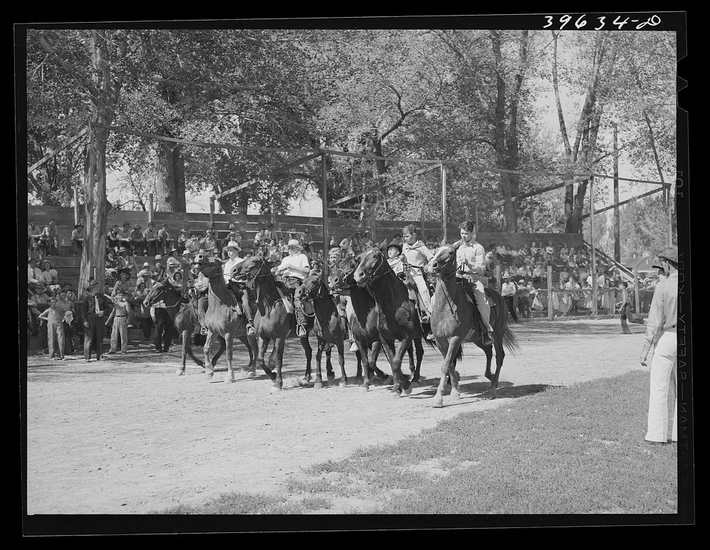 Starting line of the kids' horse race at the Fourth of July celebration. Vale, Oregon. This was a farm boys race. "No…