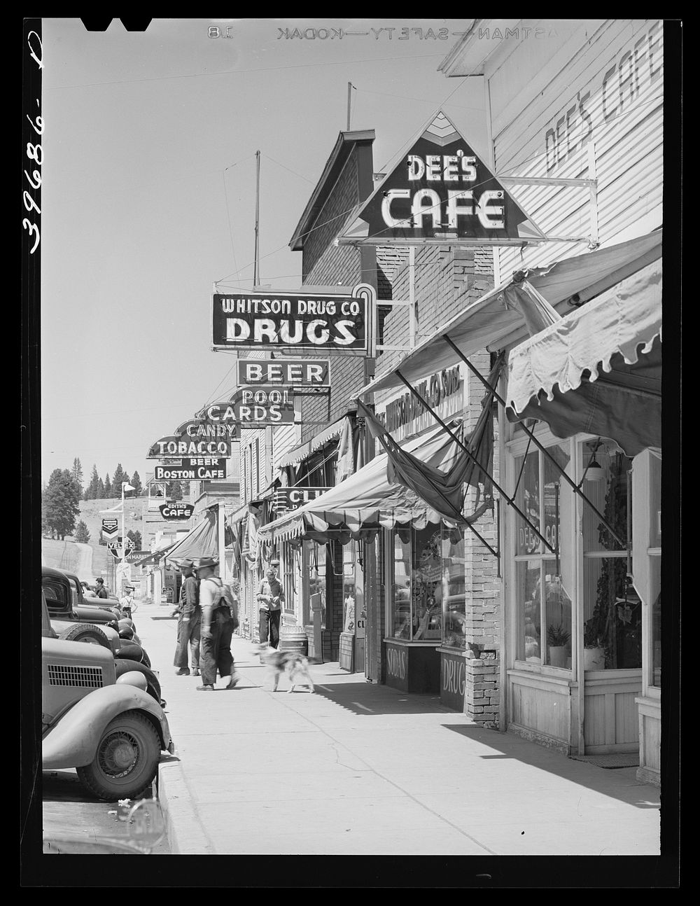 [Untitled photo, possibly related to: Street scene. Cascade, Idaho. Cascade is a microcosm of Idaho's past and present--all…