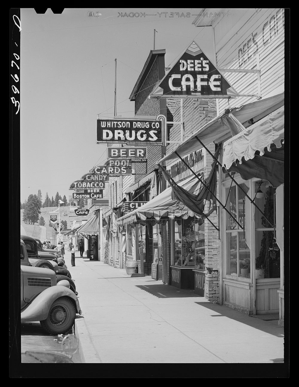 Street scene. Cascade, Idaho. Cascade is a microcosm of Idaho's past and present--all the industries of the state, including…