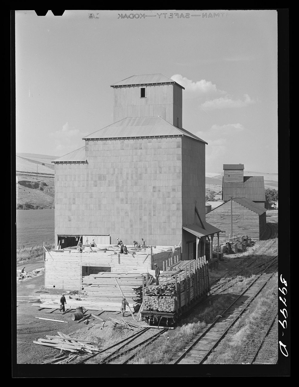 Adding new storage space to wheat elevator at Dayton, Washington. They were getting ready for a bumper crop by Russell Lee