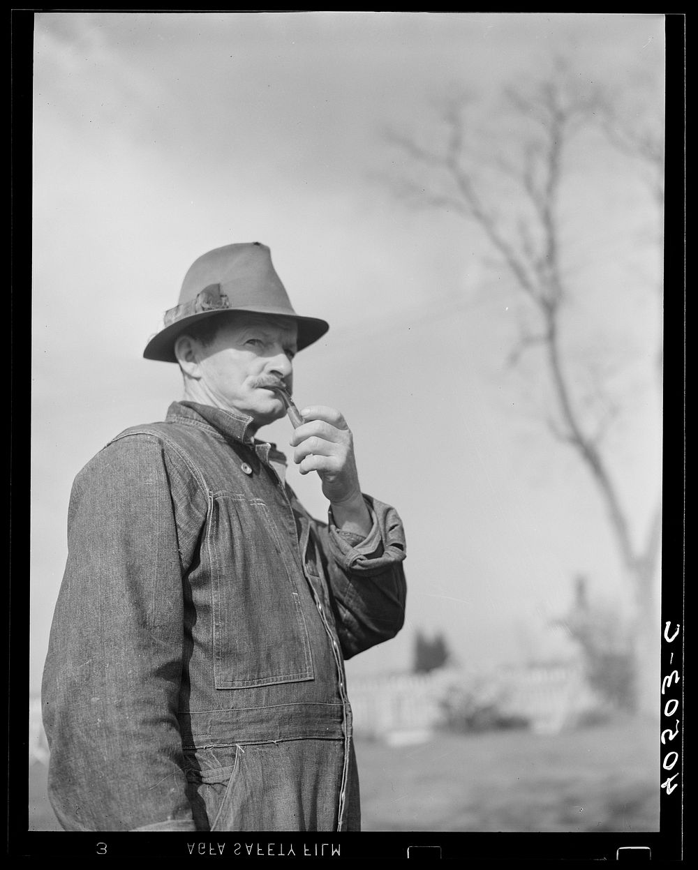 [Untitled photo, possibly related to: Retired railroad engineer who owns twenty-five acre farm. Raises corn and wheat near…