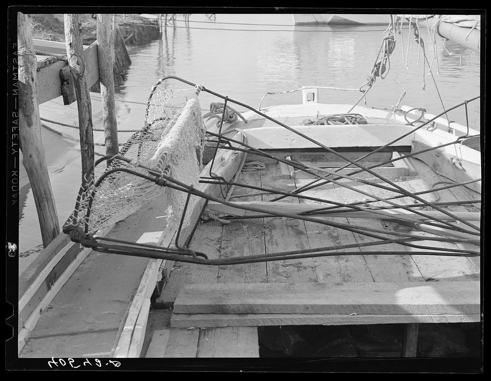 Fisherman's boat with crab net. Deal Island, Maryland. Sourced from the Library of Congress.