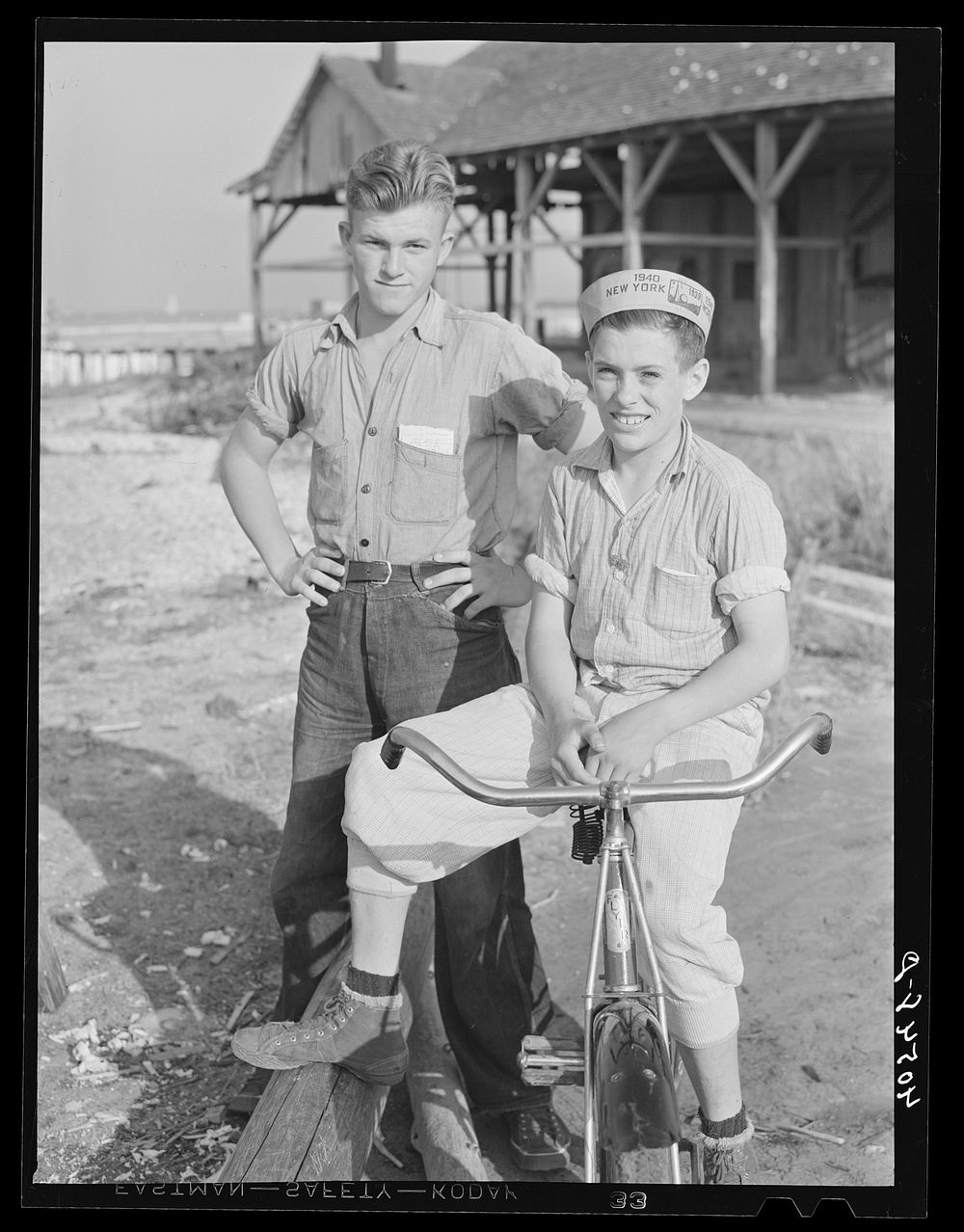 Two boys, sons of fishermen. Deal Island, Maryland. Sourced from the Library of Congress.