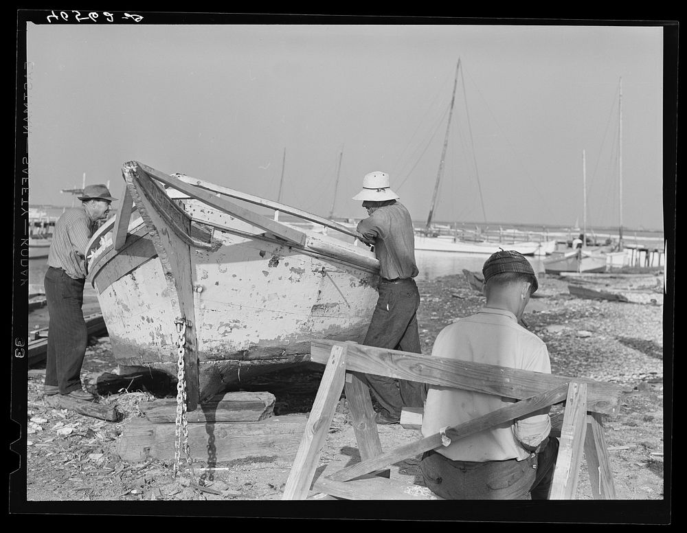 [Untitled photo, possibly related to: Fisherman watching boat being repaired. Eastern Shore Maryland]. Sourced from the…