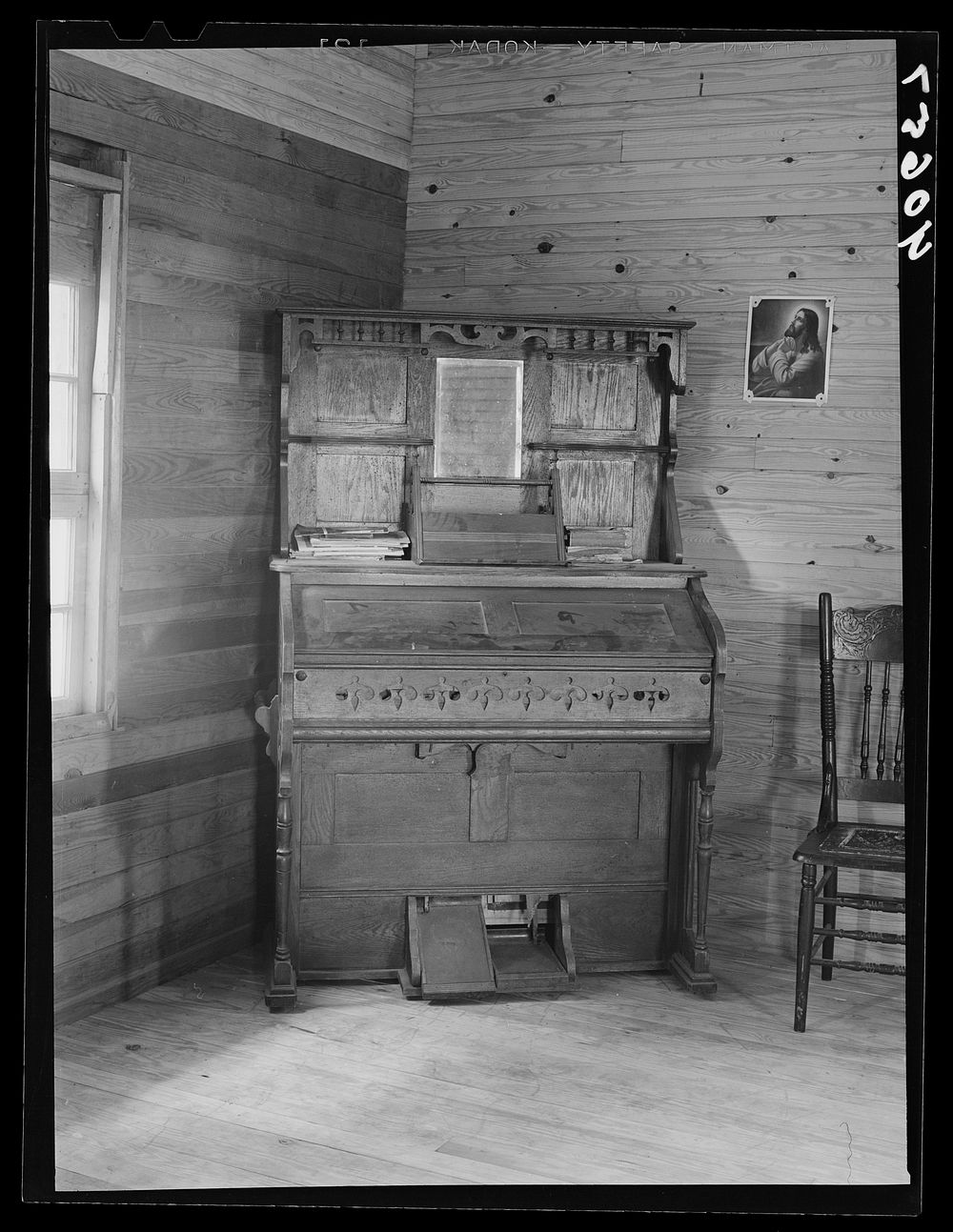 Organ in a small church near Cedar Grove, North Carolina. Sourced from the Library of Congress.