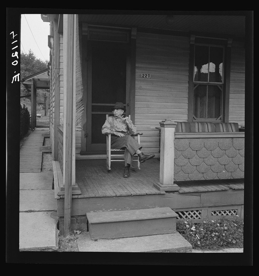 Man on porch. Upper Mauch Chunk, Pennsylvania. Sourced from the Library of Congress.