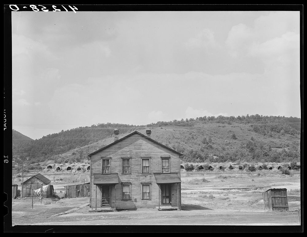 House in near-deserted town of Tyler, Pennsylvania, showing abandoned coke ovens in background. Sourced from the Library of…