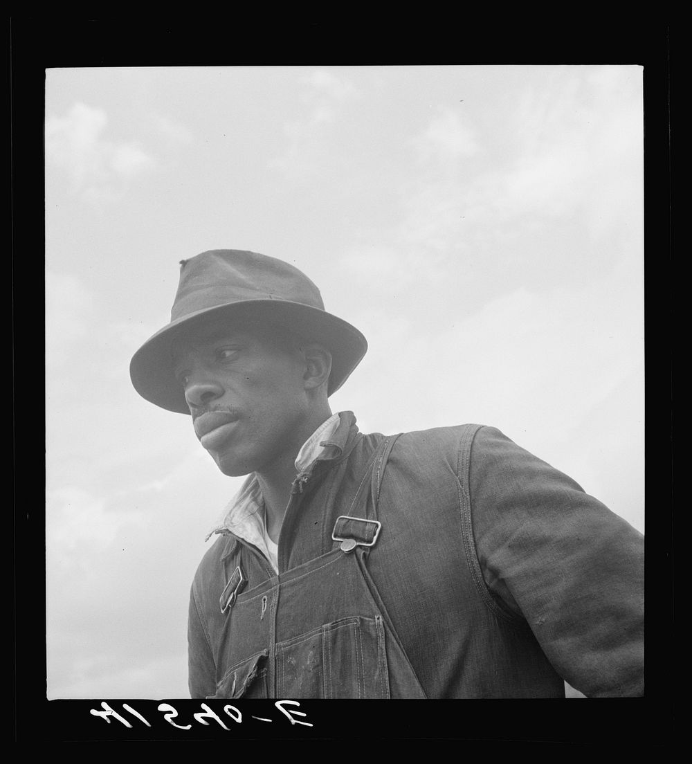 [Untitled photo, possibly related to: Mr. Miller, farmer and minister. He is the only  farmer in the submarginal area of…