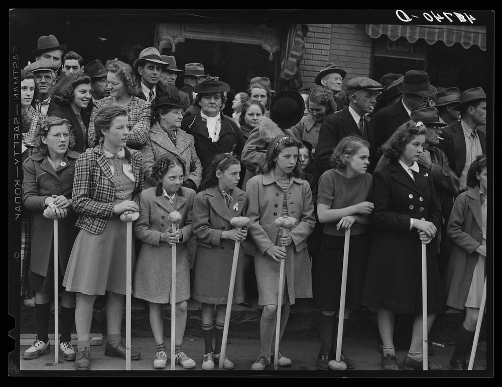 Schoolgirls and spectators at the barrel rolling contest in Presque Isle, Maine. Sourced from the Library of Congress.