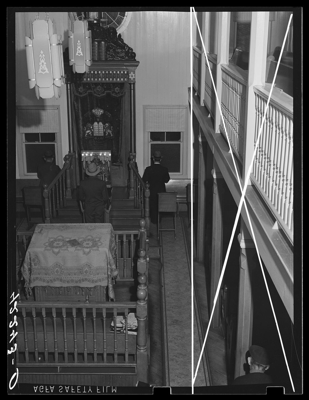 Interior of the synagogue during a small afternoon service in Colchester, Connecticut. Sourced from the Library of Congress.