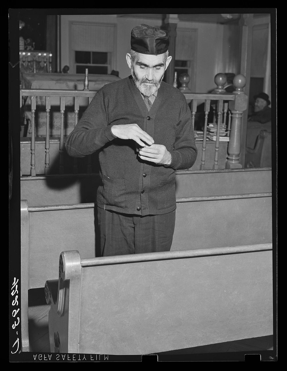 One of the Jewish residents of Colchester, Connecticut after the services in the local synagogue, taking some snuff. Sourced…
