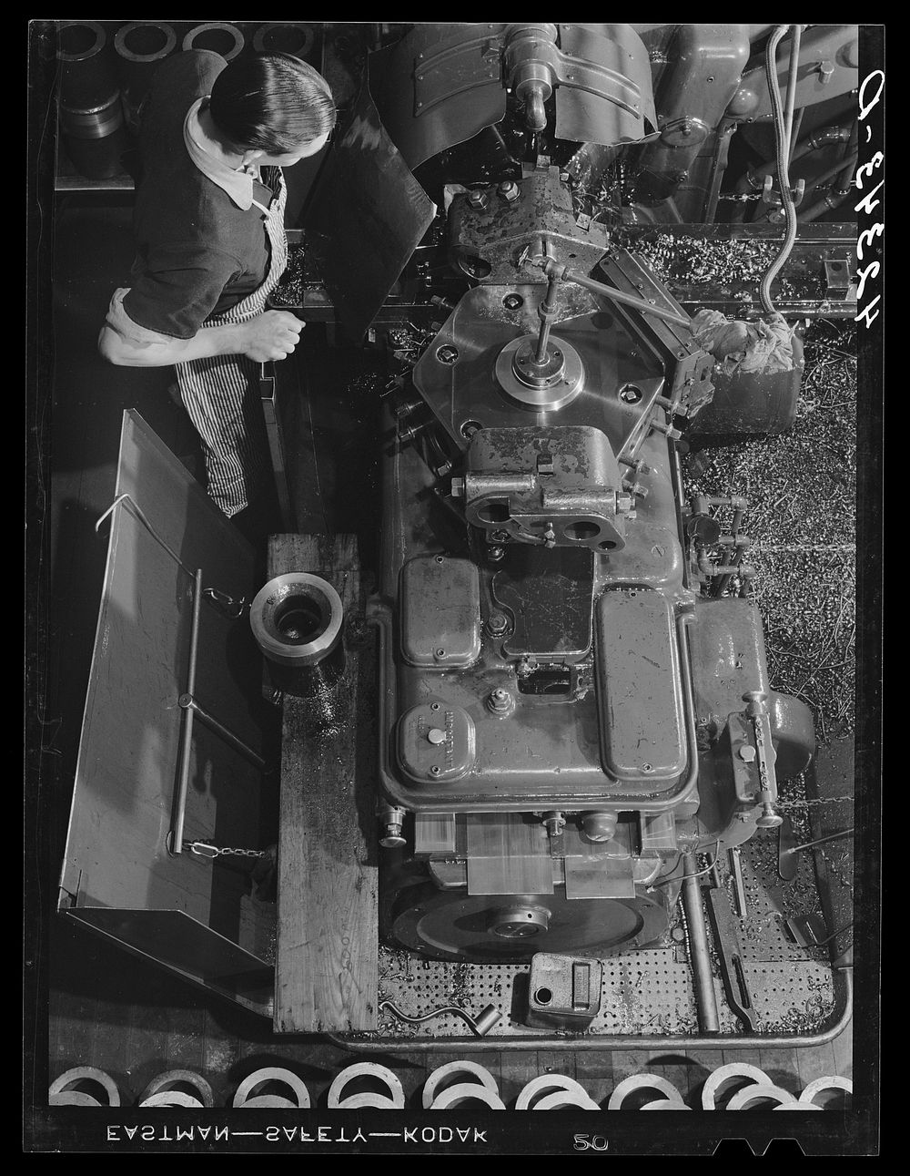 Machine used for smoothing rough castings at the Hamilton Standard Propeller Corporation. East Hartford, Connecticut.…